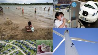 A beach, a windmill, an electric car