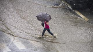 Pedestrian in rain storm