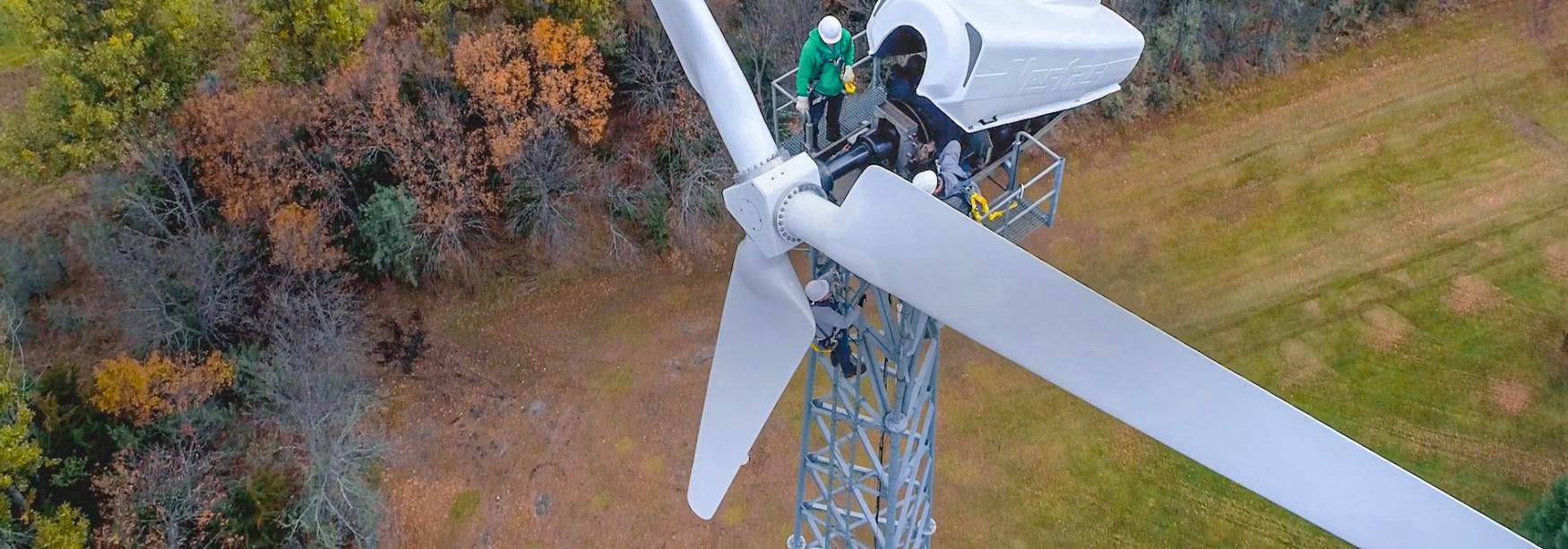 Workers servicing a wind turbine.