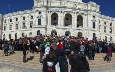 Minnesota State Capitol with crowd of people